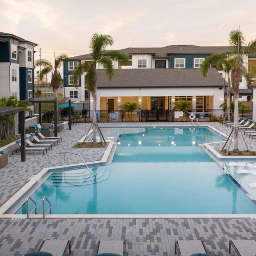 A perfect fit for the whole family a swimming pool in a resort